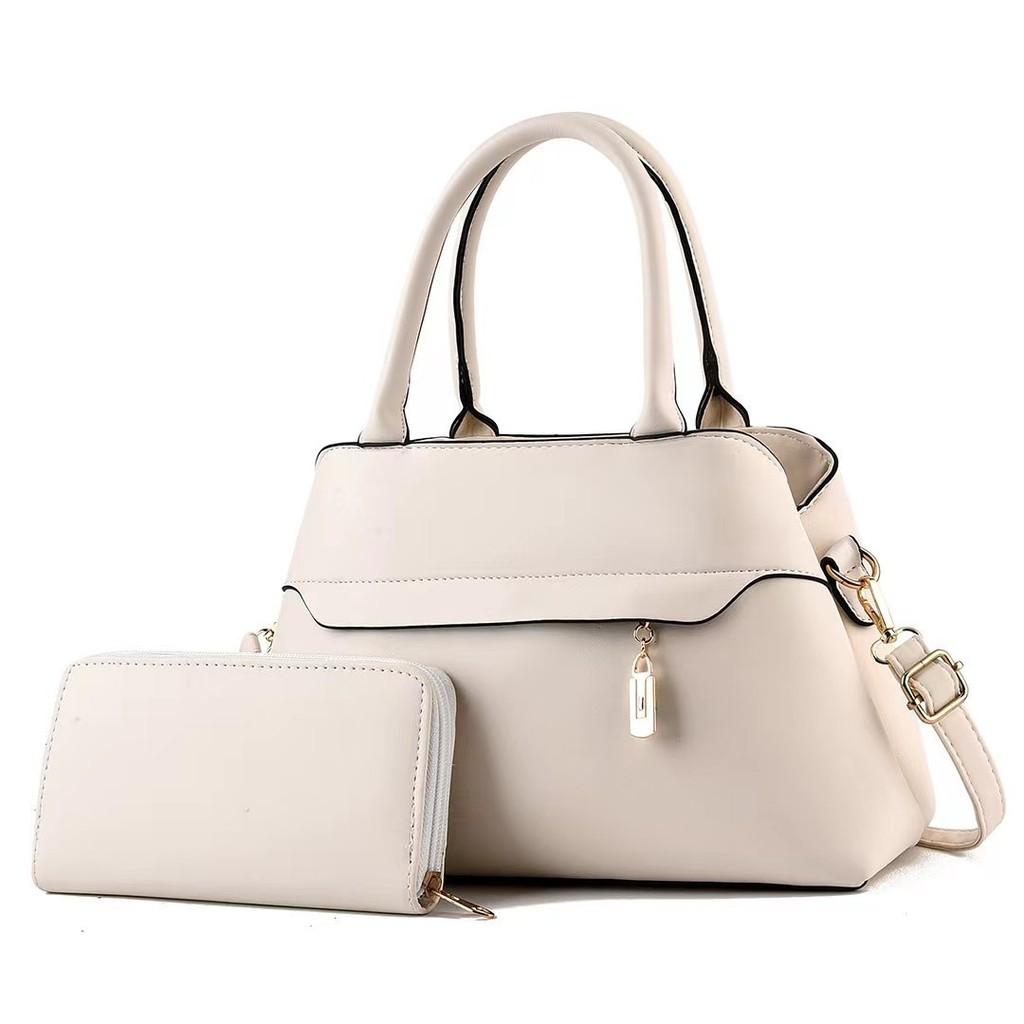 Stylish Women's Bucket Bag With Chain And Lock Closure Spacious Design For Daily Use