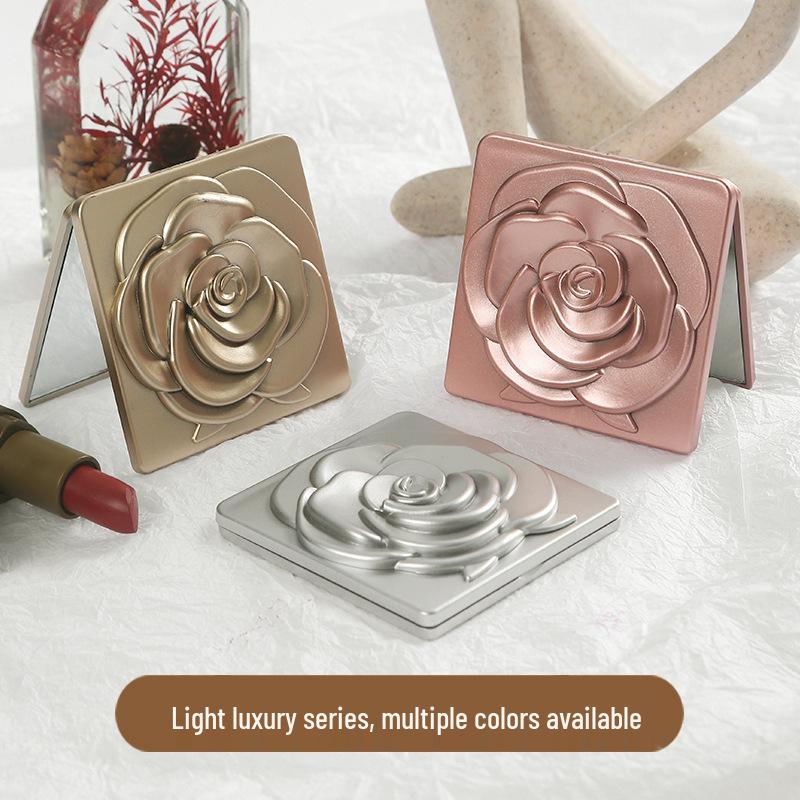 "Compact Double-Sided Folding Pocket Mirror: Magnifying & Standard for Portable Makeup".