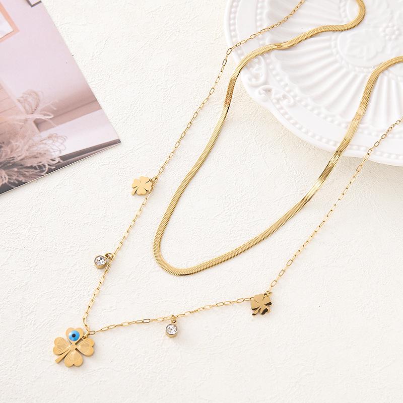 European Style Double Layer Four-Leaf Clover Necklace with Gold and Diamond Accents