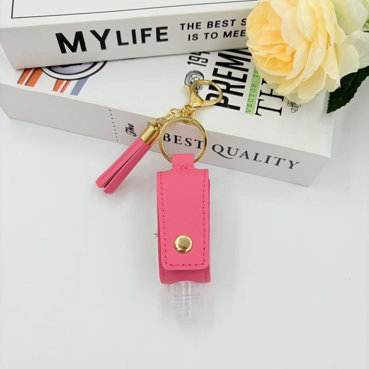 Портативный многоразовый дезинфицирующий антибактериальный брелок для ключей с подвесным орнаментом розовый