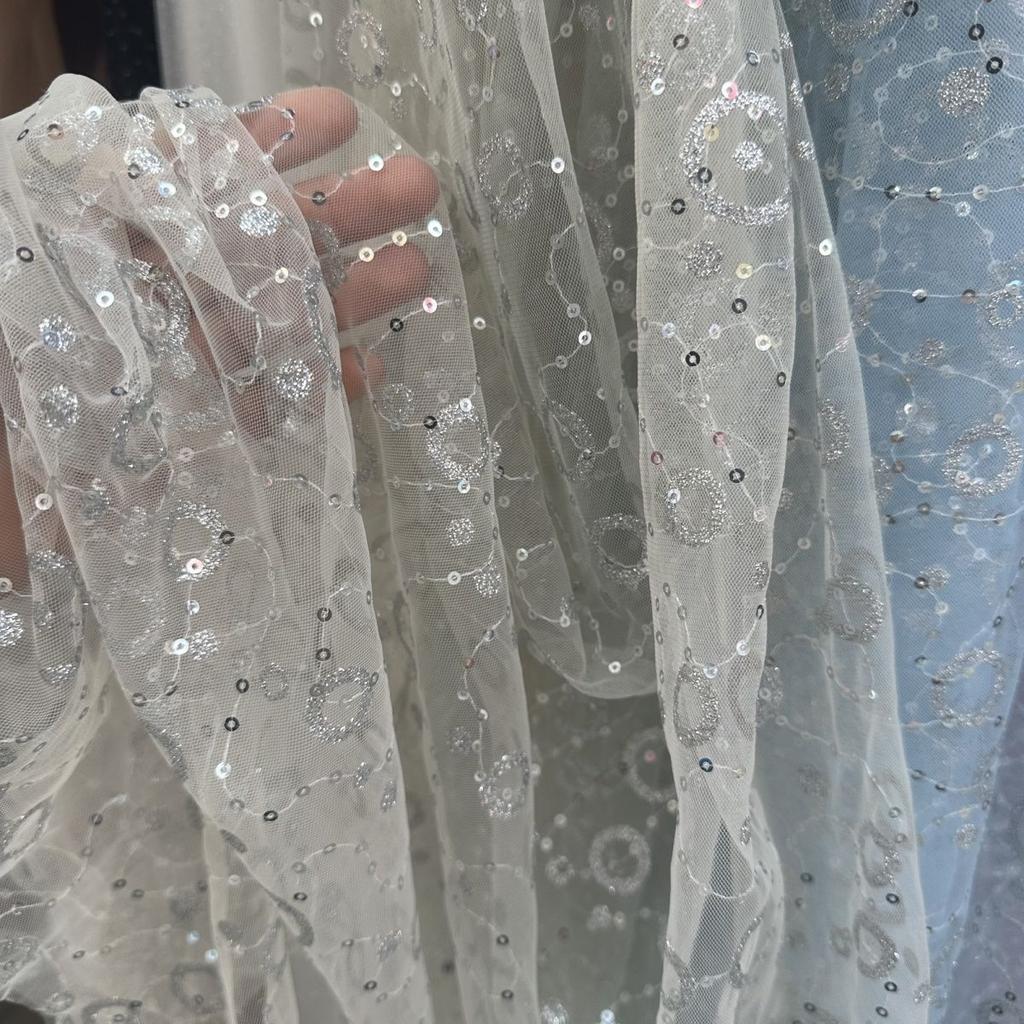 Embroidered sequin round patchwork net fabric suitable for wedding dresses formal gowns and designer clothing fabrics