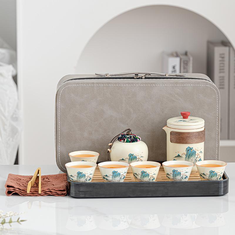 High-End Ru-Ofen Keramiktee benutzerdefiniertes Geschenk Vintage Prachtvolles Berg- und Fluss-Teeset Tragbares Business Nationaler Trend Set