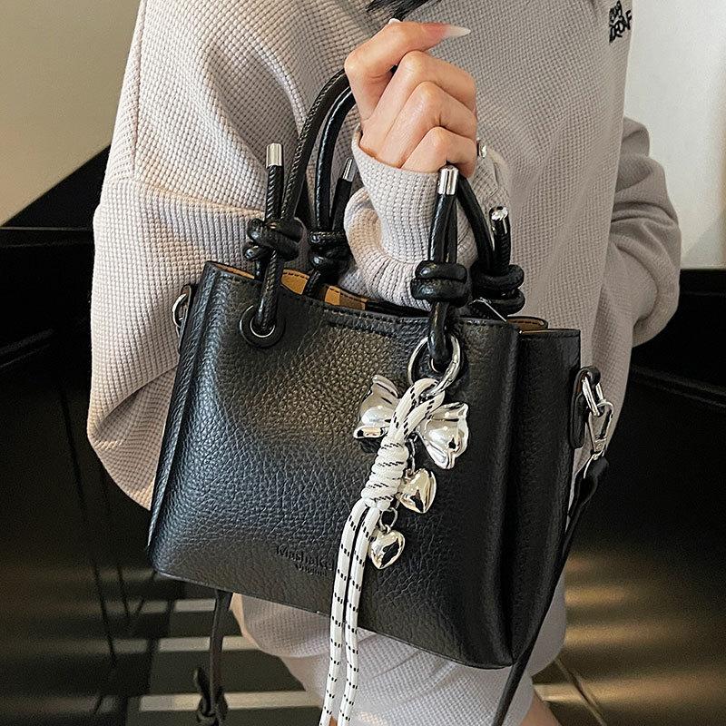 New trend casual simple wind portable bucket bag high-end lychee pattern messenger women's bag