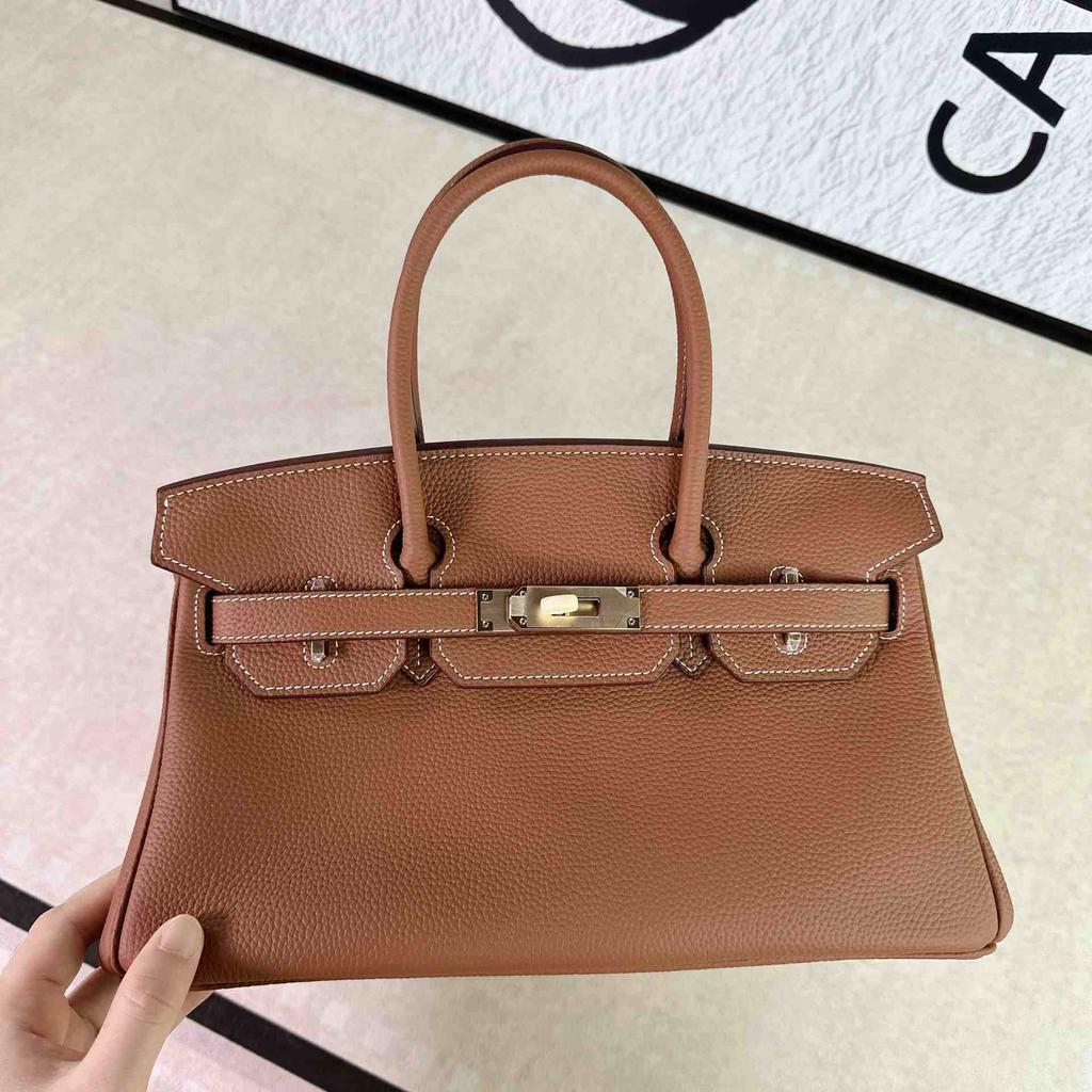 New French Stick Bag Lychee Pattern Horizontal Platinum Baotou Layer Leather Handheld Underarm Bag Genuine Leather Women's Bag