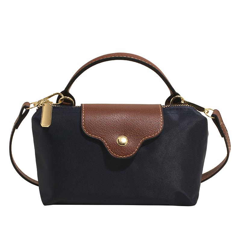 Wholesale new products niche simple contrasting color portable small bag women's leisure trendy versatile light splicing messenger change bag