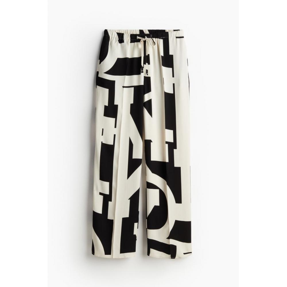 

Брюки без застежек HM черные с рисунком