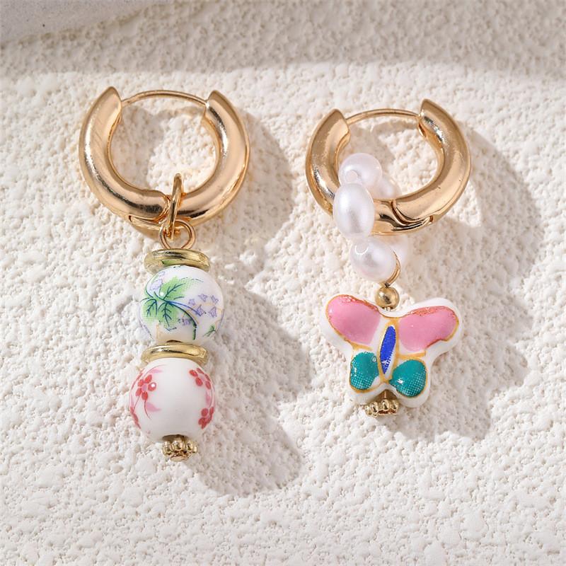 Included Geometric Pearl Drop Earrings For Women With Copper Material And Unique Shape