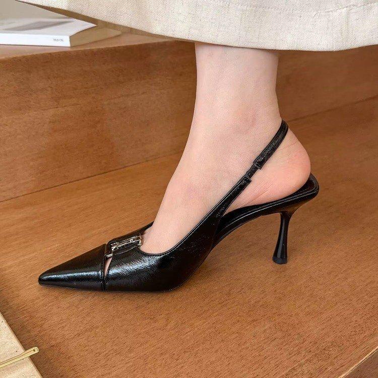 Summer 2025 new niche high-end black bag head sandals rear empty shallow mouth thin heel temperament single shoes women's shoes