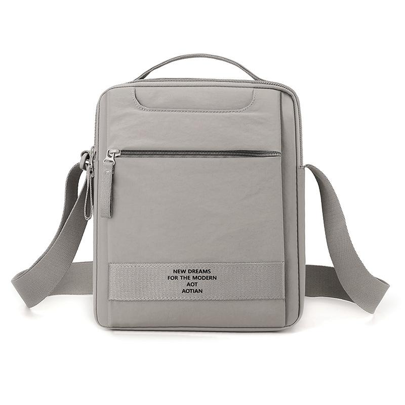 Nylonová crossbody taška s horním uchem a přední kapsou na zip pro muže i ženy pro každodenní použití