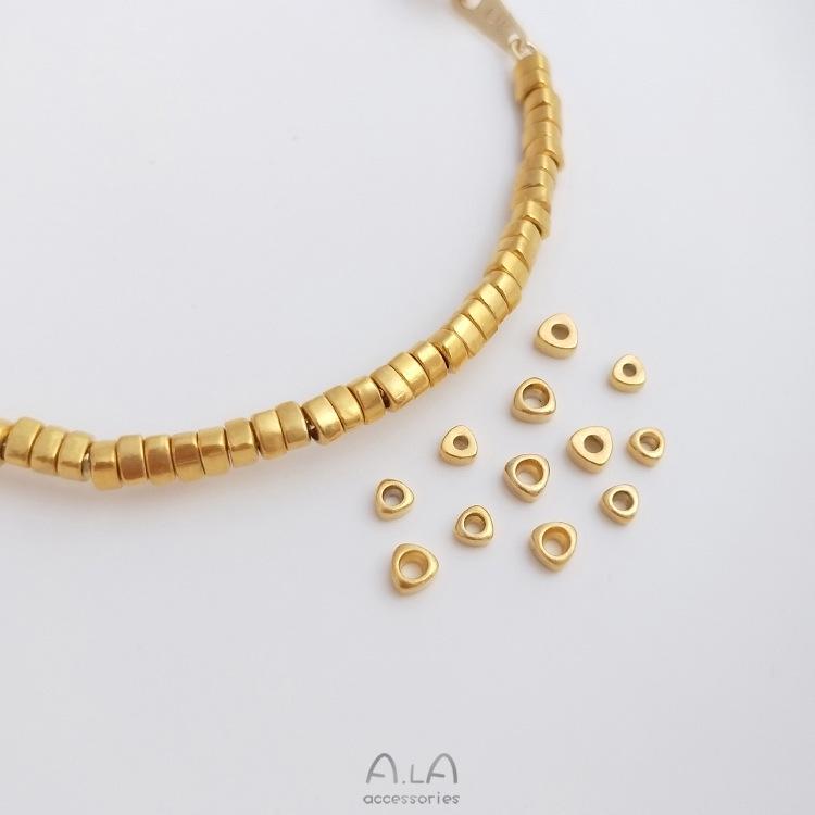 

Gold Shimmer Loose Beads: Color-Retentive Sand Gold Triangle Spacers for DIY Bracelets 2.5mm Crushed Gold Beads [10 pcs]