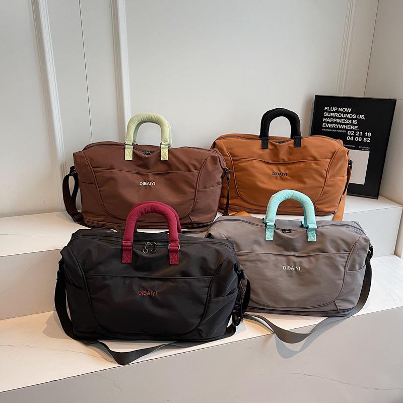 Large-capacity short-distance travel, business travel, luggage, accommodation, overnight delivery, clothing storage bag, textured commuter handbag