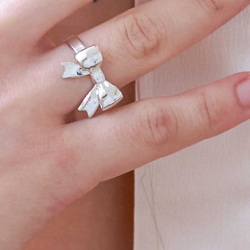 

POSTLUDE [SILVER] C RIBBON RING (2 COLORS) 11_GOLD