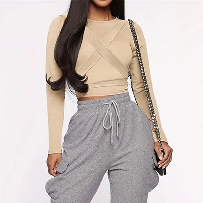 Top da donna estivo slim con corsetto a fascia svolazzante, girocollo e maniche lunghe