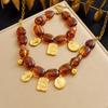 Vintage Translucent Coffee Beaded Gold-Plated Floral Butterfly Pendant Set