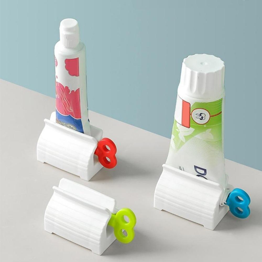 Convenient Toothpaste Dispenser Roller Toothpaste Squeezer Holder Bathroom Accessories