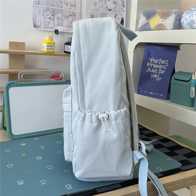Cute Butterfly Embroidered School Backpack with Front Pocket Casual Daypack for Girls Daily Use