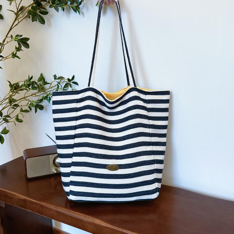 Gestreifte kontrastfarbene Canvas-Tasche 2025 neue koreanische Ins-Freizeittasche einzelne Schulter große Kapazität Tragetasche Einkaufstasche