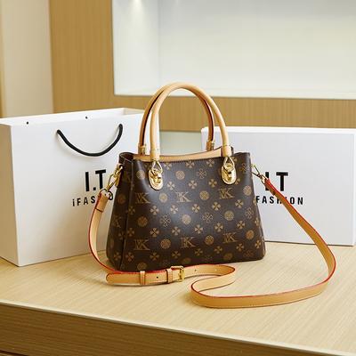 Nieuwe high-end bedrukte alfabet draagtas draagbaar niche licht luxe mode veelzijdig schoudertas schuin over het lichaam dames tas