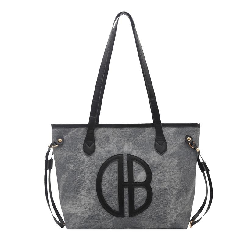

Niche design texture lazy and relaxed shoulder bag women s spring new commuter largecapacity tote bag
