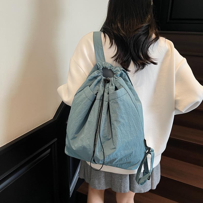 Neue lässige Messenger-Taschen für Damen und Herren, Street-Schultertaschen für Pendler, Rucksäcke mit Kordelzug und großem Fassungsvermögen.