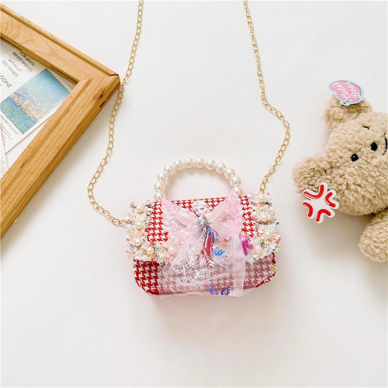 Stilvoller Prinzessinnen-Rucksack für Mädchen, verziert mit Perlen und Cartoon-Mustern in lebendigen Farben