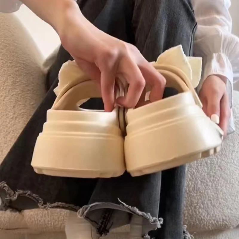 Retro high-end thick-soled 2025 new EVA bag head bow hole shoes women's summer non-slip outer sandals
