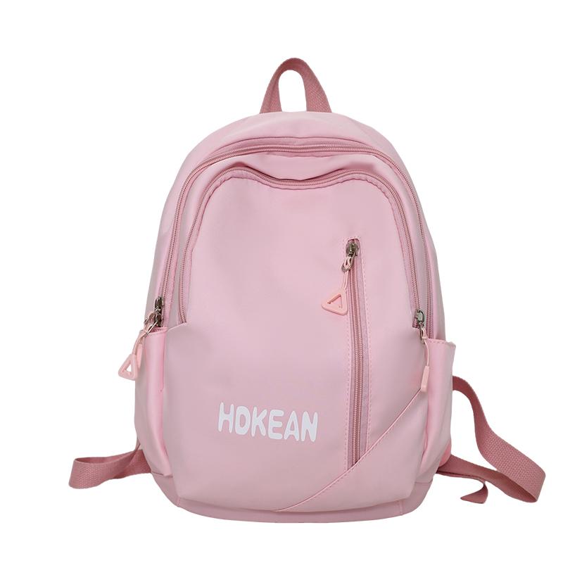 

Шкільний жіночий рюкзак молодшої школи з літерним принтом. Однотонний рюкзак великої місткості рожевий