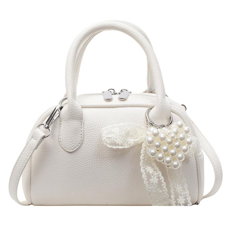 Fashion messenger bag niche casual small square bag women's 2025 summer new hand carry simple commuter shoulder bag