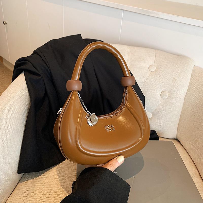 Niche design sense retro fashion portable small bag women's autumn new Maillard shoulder armpit bag