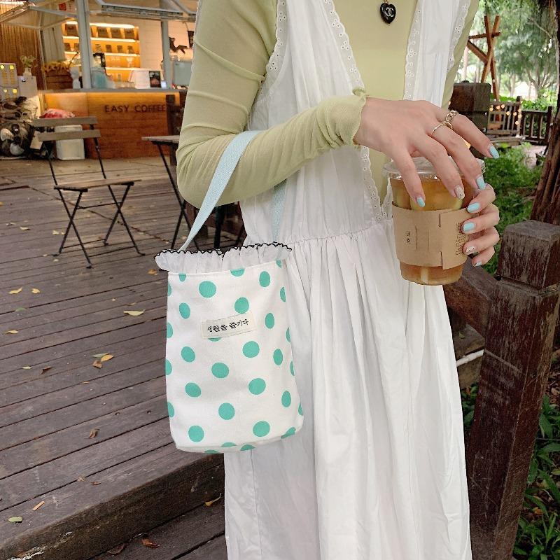 

2 literary new polka dot portable mini bento bag casual women s small hand bag portable