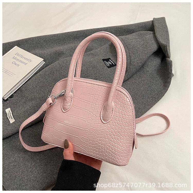 

2025 Spring New Women s Bag Fashion Shoulder Bag Simple Versatile Shell Bag New Crossbody Bag Portable Women s Bag рожевий