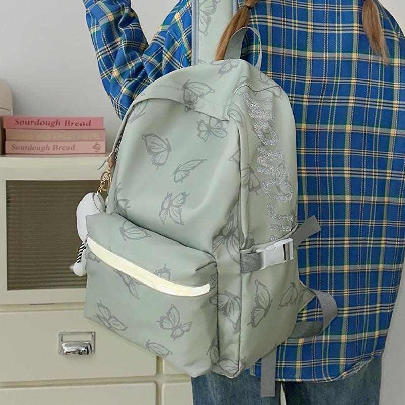 Schulrucksack Neuer Schmetterling Große Kapazität Modischer Rucksack Lässiger Vielseitiger Rucksack für Männer und Frauen High-School-Schüler Campus-Schüler-Tasche Großhandel