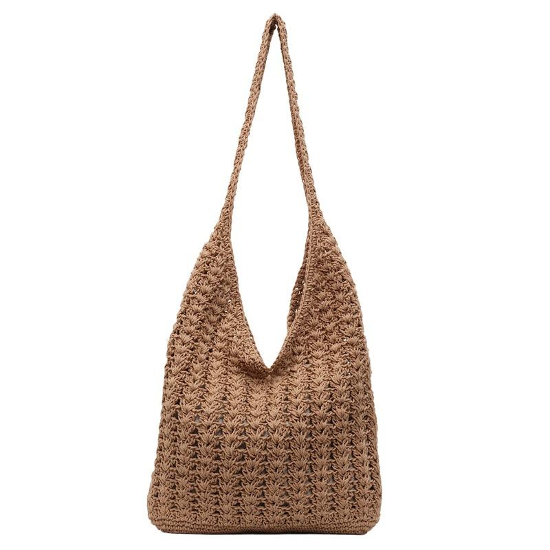 

Leisure and vacation single shoulder oblique span bag summer new women s commuter bag hollow design large capacity armpit bag хакі