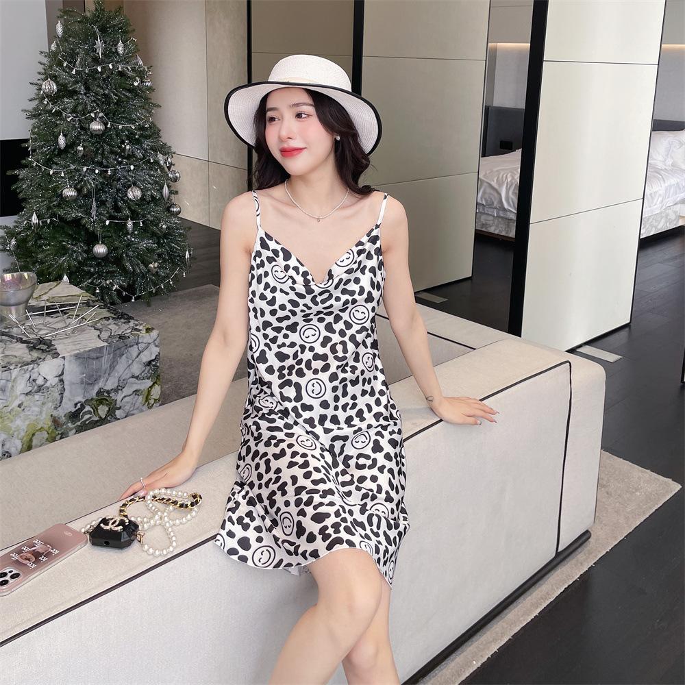 Summer new pajamas women's ice and snow silk thin suspender swing collar pure desire pajamas printed medium and long skirts