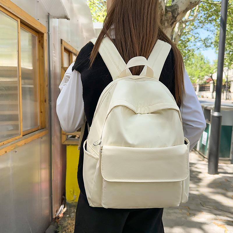 Sac à dos simple couleur unie pour fille grande capacité sac d'école étudiant léger sac d'ordinateur de voyage 1011 nouvelle mode campus