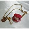Used Q-pot. Plum Macaron Necklace