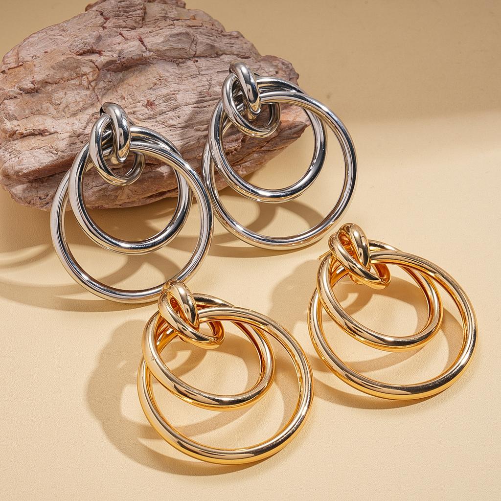 Geometric round winding hollow steel needle earrings environmentally friendly niche earrings