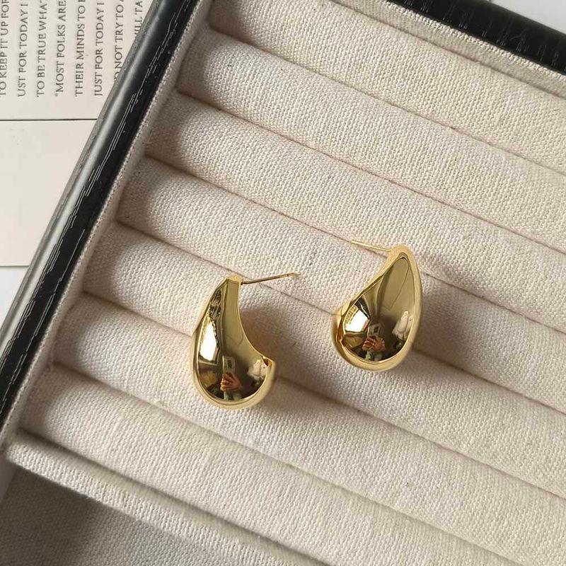 

Fancy Gold Asymmetrical Streamline Design Collar for Women 2024 Fall and Winter New Arrival Fashion Style Short Necklace Gold Earrings
