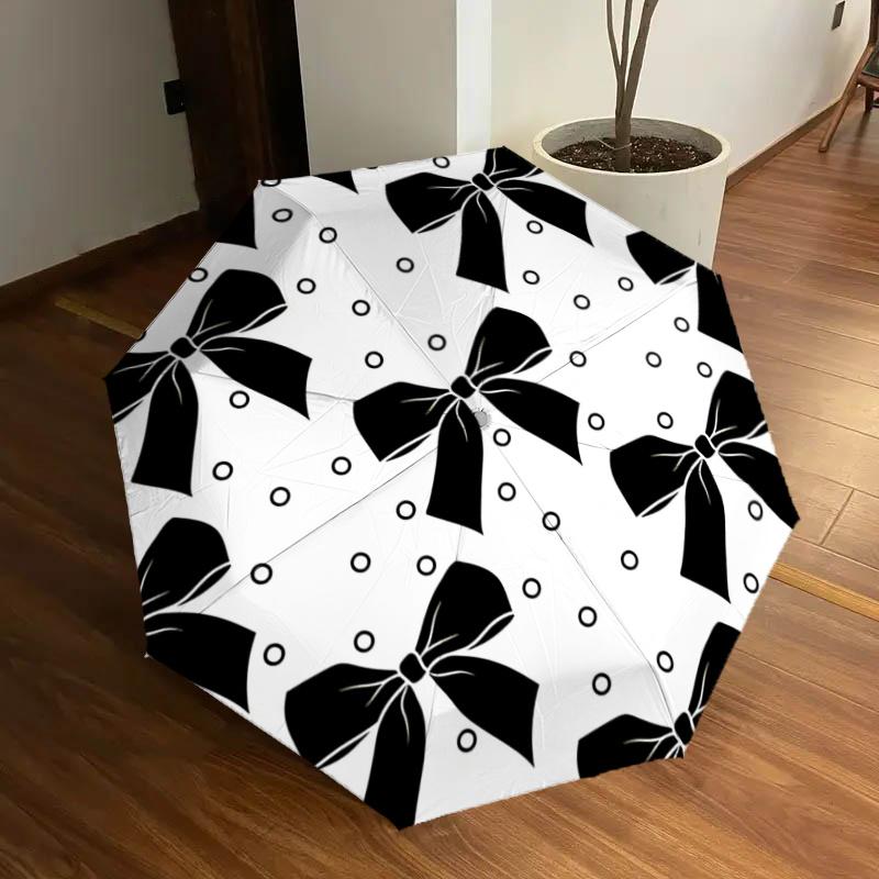 

Black Bowknot Patterned Automatic Opening Folding Umbrella with 8 Bone Iron Frame Perfect for Outdoor Use,Festive Gifts,Travel,Daily Us