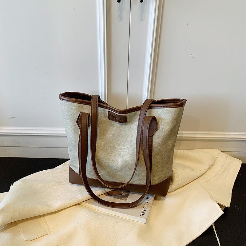 

Fashion commuter large-capacity bag women s spring new shoulder bag college student portable tote bag