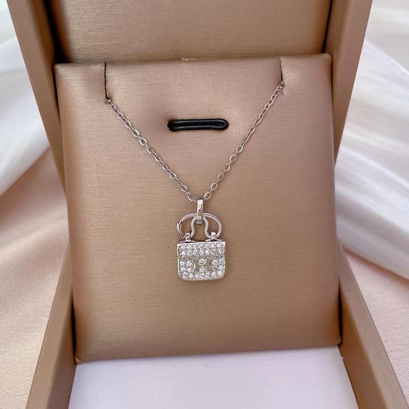 All-Match Titanium Steel H Bag Necklace - Advanced Design Clavicle Chain with Diamonds for Women - Perfect Gift for Girlfriends.