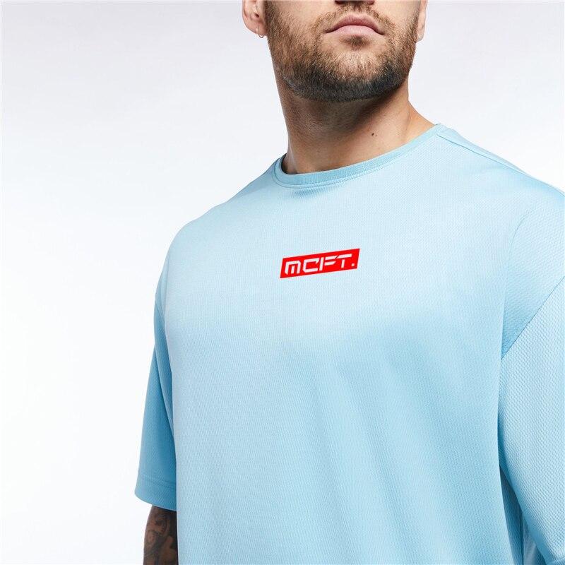 Muscleguys Pánské sportovní fitness oblečení volné tréninkové tričko s krátkým rukávem léto rychle schnoucí