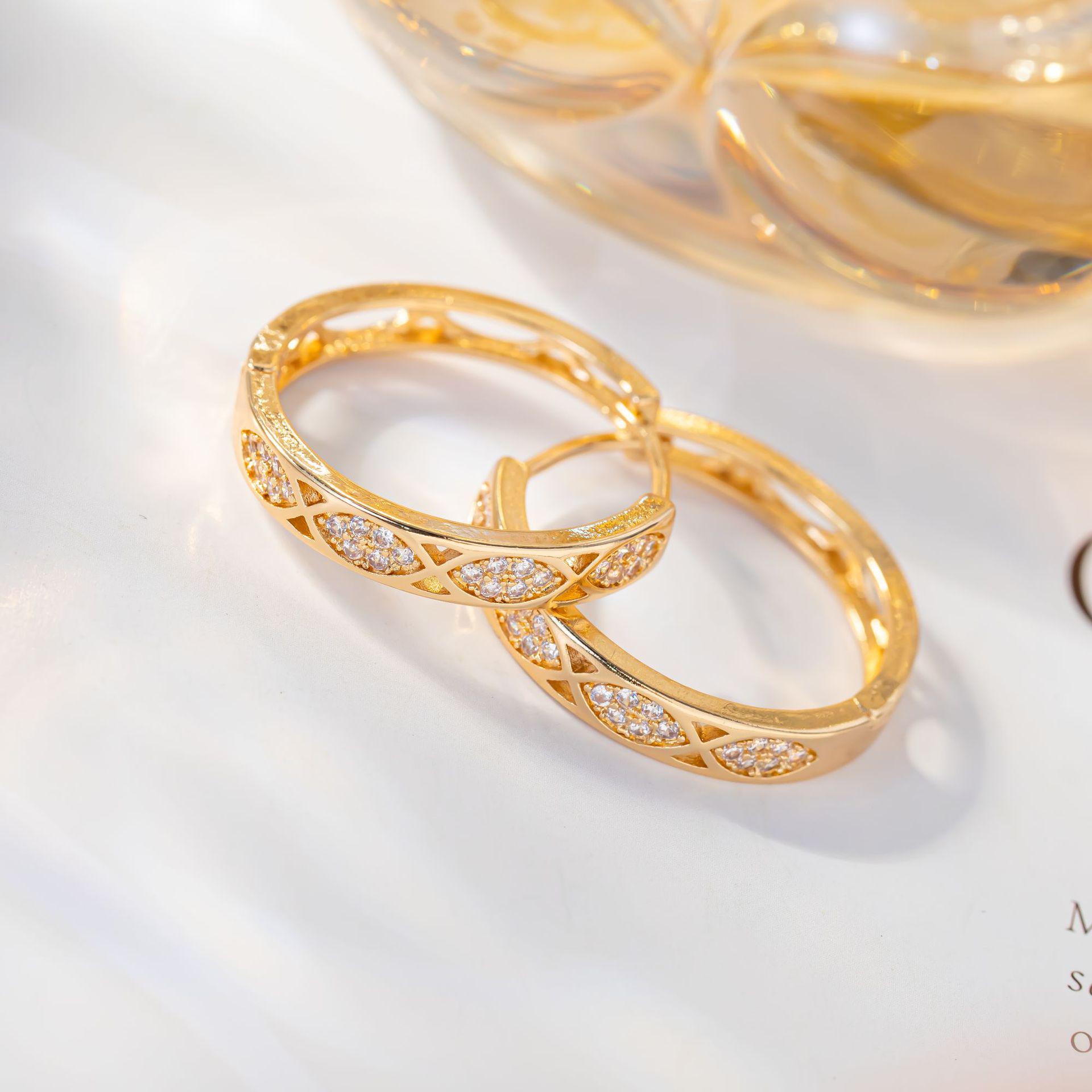 New Zirconia Hollow Shuttle Pattern Fashion Ear Cuff in Gold-Plated Copper - Elegant Cross-Border European & American Style Women s Earring.