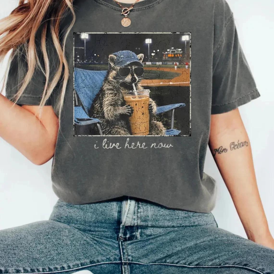 Raccoon I Live Here Now T-Shirt, Funny Animal Graphic, Softball Mom Baseball Gif S