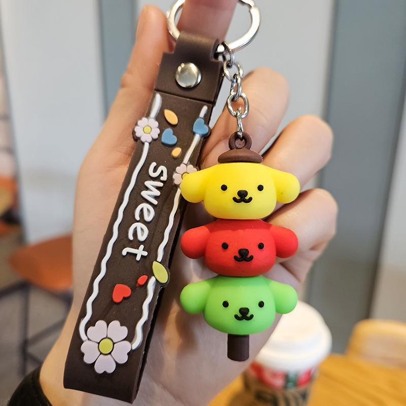 Yugui Dog Gestapelter Le Schlüsselanhänger Niedlicher Cartoon Melody Pudding Dog PVC Puppe Taschenanhänger