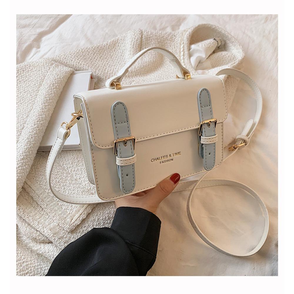 This year's popular bags are women's autumn and winter new high-end niche design messenger bags, foreign-style portable small square bags.