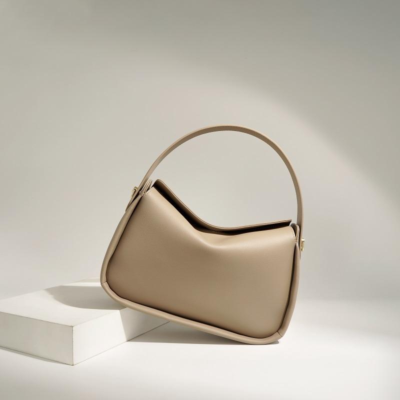 Leather commuter versatile hand carry office worker niche handbag women's high-end sense bag women's messenger dumpling bag