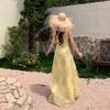 2026 summer French vacation ruffled small fly sleeve cream yellow print V-neck spaghetti waist-cinching fairy dress