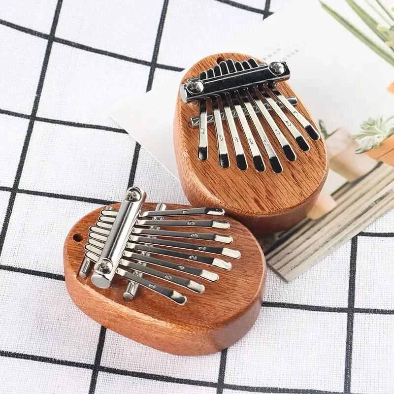 1Pcs Wood Mini Thumb Piano Musical 8 Tones Portable Beginner Finger Piano Kalimba Musical Instruments