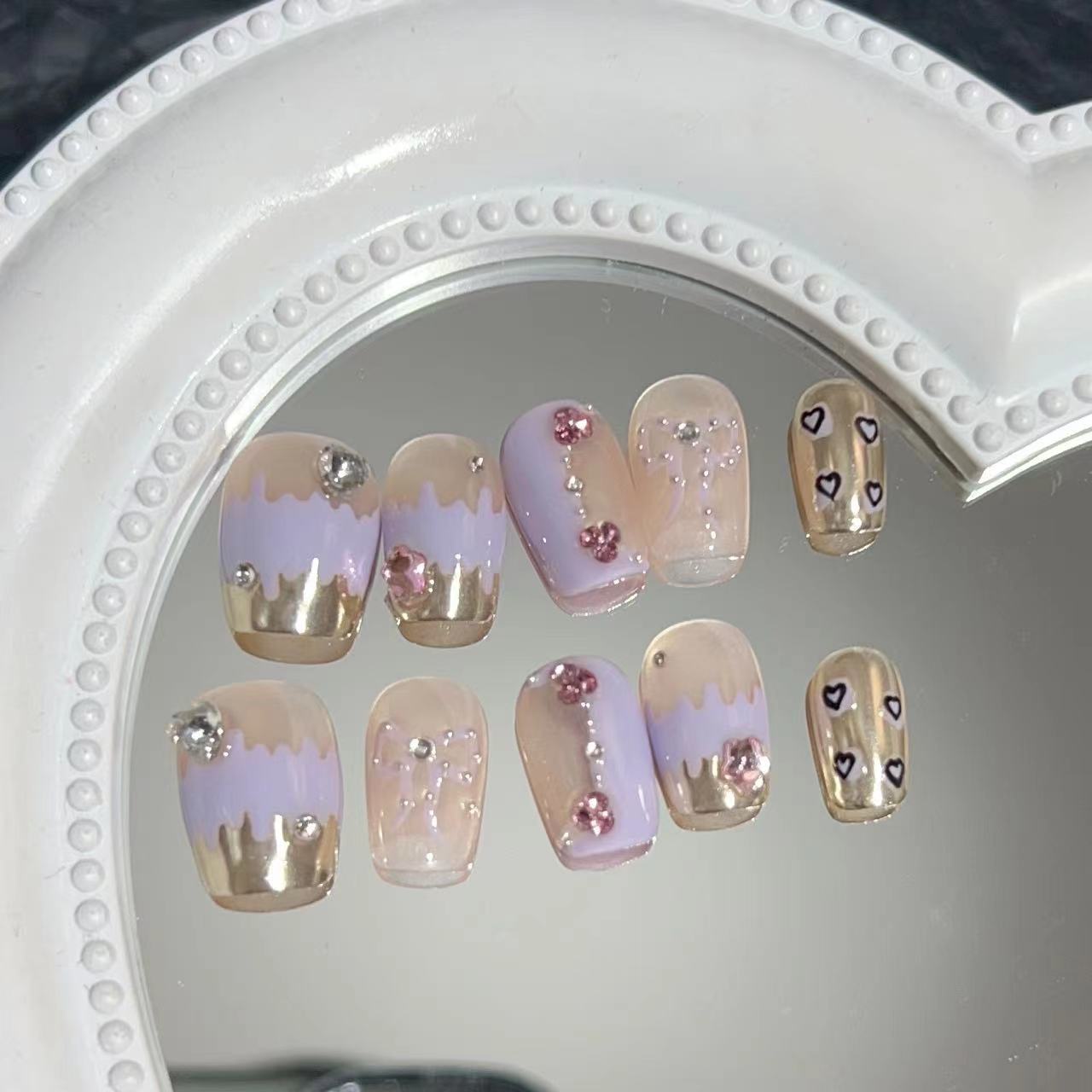 

Ношение брони Чистый ручной маникюр Готовые накладные ногти Ins Телесный цвет Фиолетовый таро Бант любви Волшебная зеркальная пудра Large L